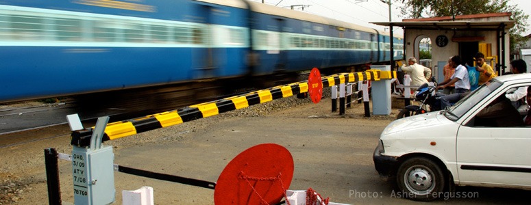 blue-train-crossing-india-travel