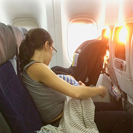 How can I help my baby sleep on the plane?