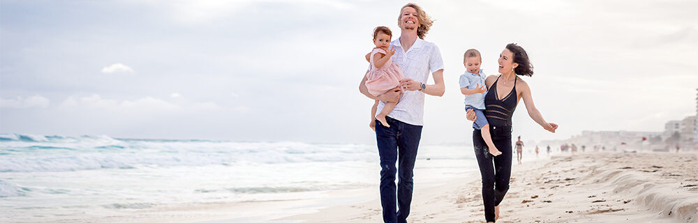 fergusson family at beach in cancun mexico