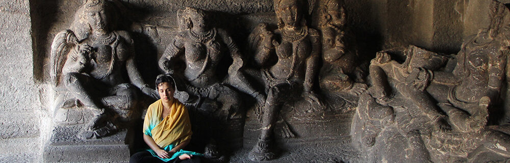 lyric fergusson meditating in a cave in india
