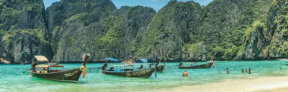 Island beach with boats