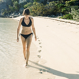 Lady on beach in Bahamas
