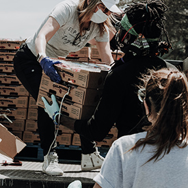 Volunteers unloading