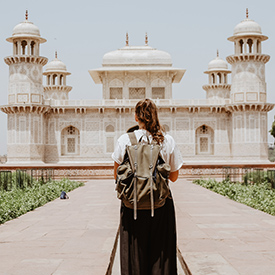 Woman in front of a castle