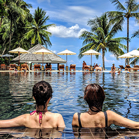 Women in pool at a resort