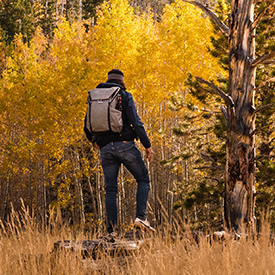 guy hiking in the fall