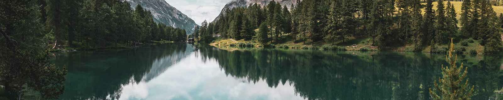 Mountains behind a lake with fresh air