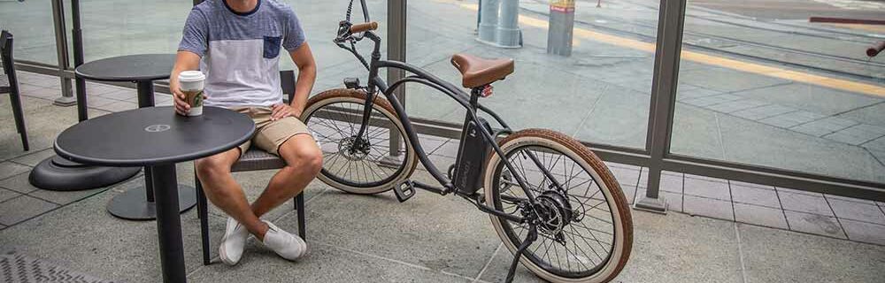 Electric bike with owner at cafe