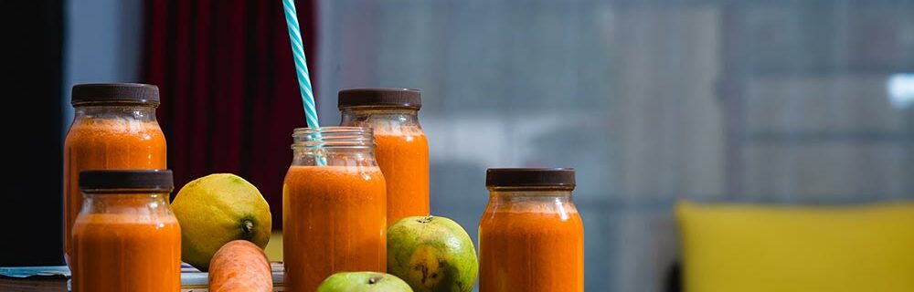 juiced carrot juice in glass containers