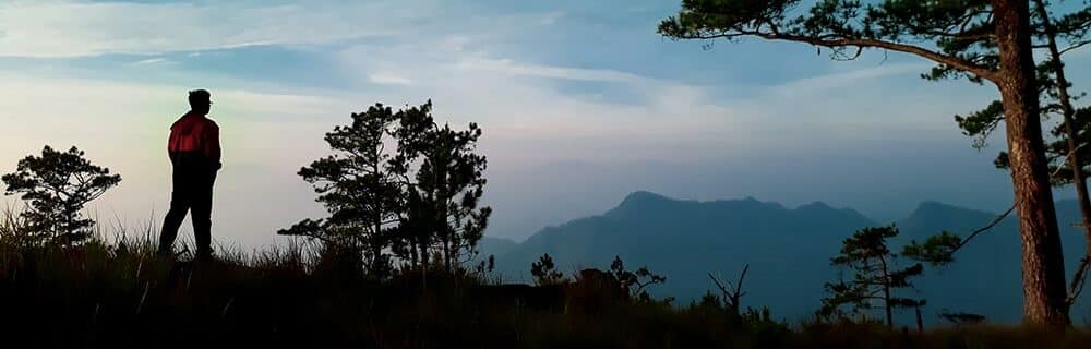 Backpacker on mountain