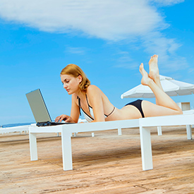 Lady working by the pool