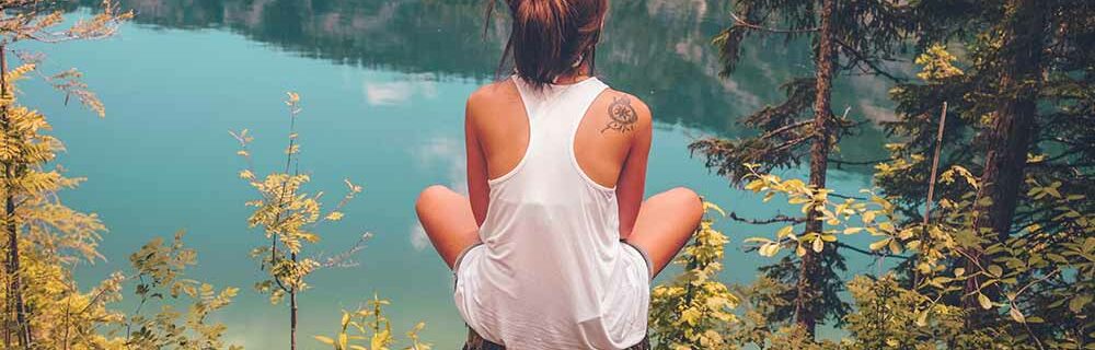 woman's back looking at rive