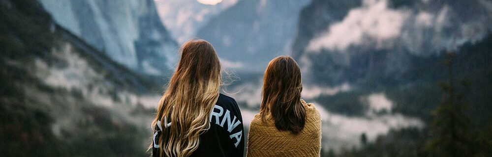 Girl scouts looking at mountain view
