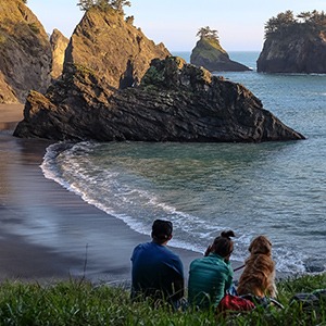 Enjoying secret beach in Oregon with dog
