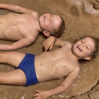 My son Kingsley and his sister enjoying the sun at our home in Hawaii
